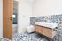 products/HERITAGE_CUADRADO_CARIBE_PATCH_BATHROOM.JPG