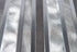products/METAL_SYMMETRY_GRAY_ALUMINUM_BRUSHED_RECTANGLE_TILE_CLOSE_UP.jpg